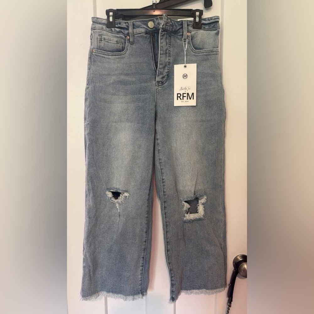 Women's Distressed Blue Jeans